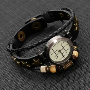 Macro view of vintage multi-layer leather wrap bracelet watch with star charms and beads