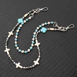 Close-up of double-layer beaded jeans chain with blue and white cross beads