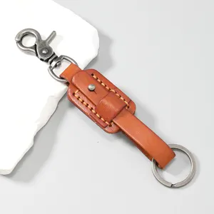 Close-up of vintage brown leather keychain with sturdy metal lobster clasp