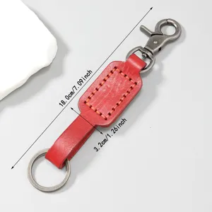 Retro red cowhide leather keychain with metal clasp showing 18cm length dimension