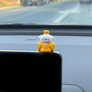 Detailed view of a cute mini emperor dog car dashboard figurine, perfect interior decoration.