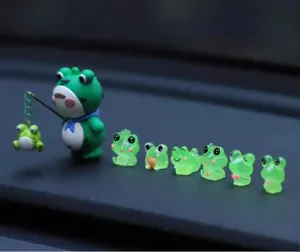 Luminous little frog car ornament, cute miniature resin figurines for dashboard and desktop decor.
