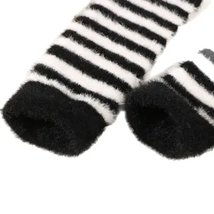 Black and white striped knit arm warmers, cozy winter long fingerless gloves for women.