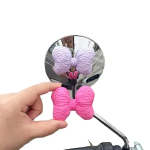 Cute quilted bow rearview mirror decoration for electric motorcycles, stylish pink accessories.