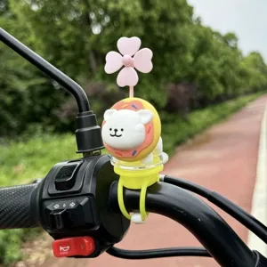 Cute bicycle dog toy with propeller, motorcycle handlebar decoration, lovely cartoon pet accessory.
