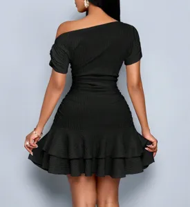 Black one-shoulder ruffled mini dress detail, showing textured slim fit and double layers.