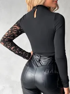 Close-up view of the slim-fit top featuring stylish lace spliced sleeves and elegant cutout back.