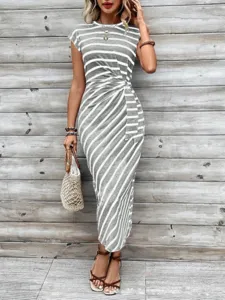 Detailed view of women's casual striped long dress with side tie waist and split hem.