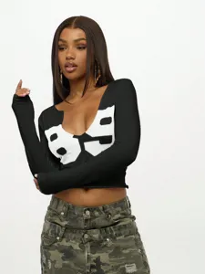 Sexy slim fit cropped long sleeve T-shirt with U-neck and white graphic print detail.