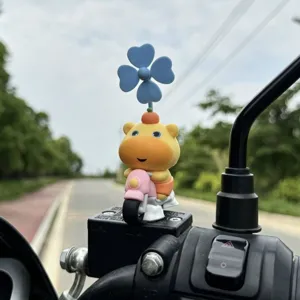 Cute capybara scooter figurine with spinning clover propeller for motorcycle and bicycle decor