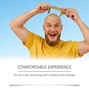 Wooden scalp massage comb detail view, ergonomic curved design for comfortable daily use.