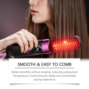 Detail shot of wireless hair straightening brush with digital temperature display and red light.