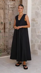 Elegant black U-neck sleeveless maxi dress for women summer casual wear fashion look.