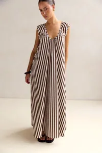 Close-up detail of the elegant brown and white vertical striped U-neck maxi dress fabric and fit