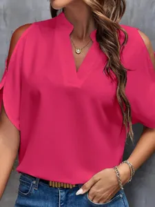 Detailed shot of a hot pink V-neck cold shoulder blouse for women, elegant summer top style.