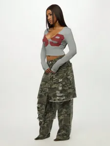 Grey U-neck crop top with red graphic print paired with stylish camouflage cargo pants.