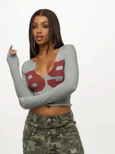 Sexy slim crop long sleeve T-shirt with graphic print, U-neck design for women spring fashion.