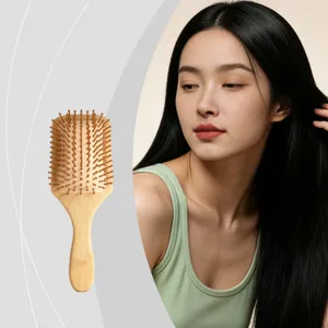 Natural bamboo hair brush with cushion base for gentle scalp massage and daily hair care.