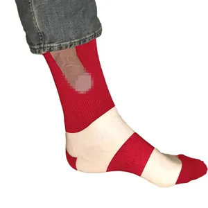 Funny novelty red white striped socks with pixelated graphic design for party gifts.