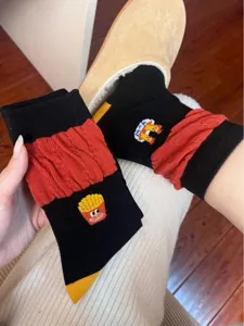 Detailed shot of funny fast food themed mid-calf socks with cute cartoon embroidery design.