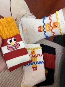 Funny fries burger print mid-tube socks, creative cute dopamine style socks for women detail view.