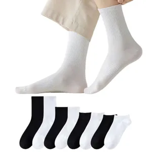 Men cotton crew socks set, black and white athletic casual socks displayed for main listing.