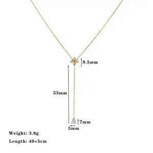 Detailliertes Maßdiagramm einer goldenen Y-Halskette mit Quasten und Blumenanhänger