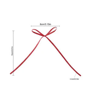 Red ribbon bow cake topper, decorative bow for birthday party dessert baking and celebration events.