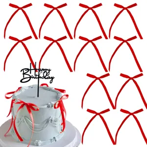 Set di fiocchi in nastro rosso e topper per torta buon compleanno in acrilico nero.