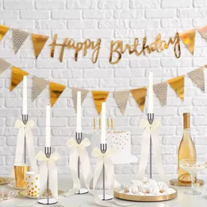 Metal candle holders with white ribbon bows detailed shot, perfect for wedding and birthday party.
