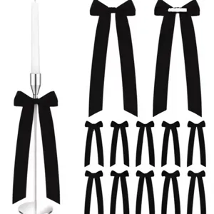 Set of black ribbon bows with long tails for party, wedding and candle holder decoration.