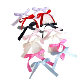 Rubans nœuds en polyester coloré pour loisirs créatifs DIY, boîtes cadeaux et emballages floraux.
