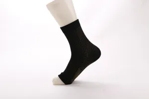 Detailed view of black compression foot sleeve showing knit texture and ankle support design.