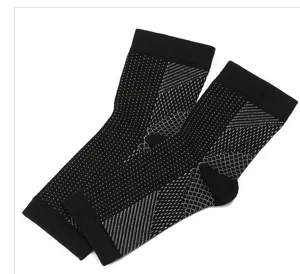 Black white sports compression ankle sleeves, breathable elastic foot protection gear for fitness.