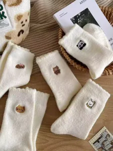 Winter cute embroidered plush socks for women, warm fuzzy mid-tube socks with sweet design.