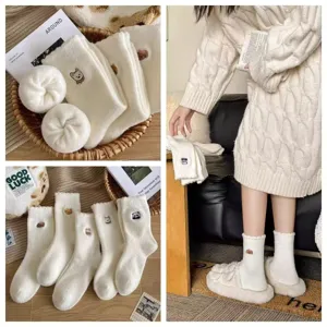 Cozy winter plush mid-tube socks with cute cartoon animal embroidery, soft and warm daily wear.