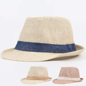 Straw fedora sun hat for men and women, classic woven beach vacation cap with stylish band.