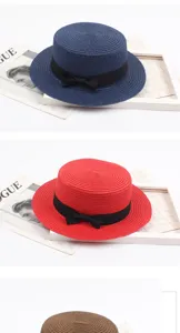 Summer flat top straw hat with black bow vintage style sun protection beach detail view