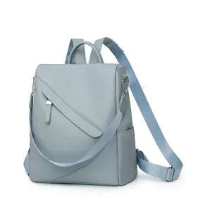 Detail view of casual anti-theft women backpack with stylish diagonal zipper and soft leather.
