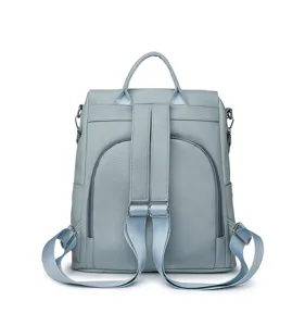 Women's anti-theft casual PU leather backpack in light blue color, rear view detail.