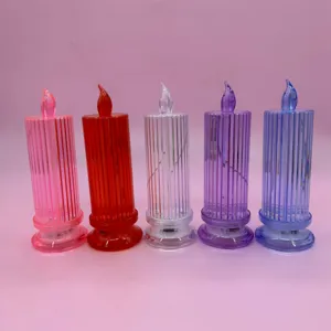 Ensemble de bougies électroniques LED transparentes côtelées colorées pour décoration de fête.