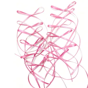 Pink ribbon bow decorations for birthday cakes, baking desserts, and festive party gifts.