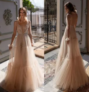 Stunning deep V sheer tulle sequin long evening dress with backless design for elegant events.