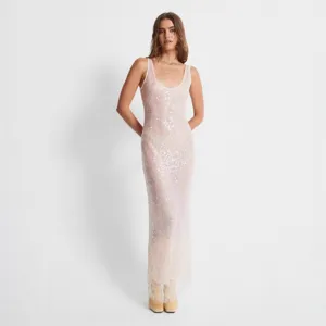 Detailed view of a stunning pink sequin maxi dress, sleeveless slip style for evening parties.