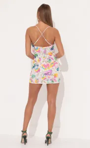Detailed view of the sexy cross-back floral sequin bodycon mini dress showing texture.