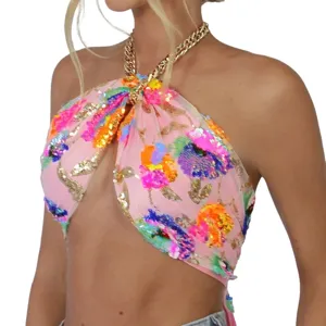 Pink sequin floral embroidered halter crop top detail view, stylish and vibrant party wear.