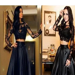 Detailed view of the elegant black lace crop top and satin maxi skirt two-piece party gown.