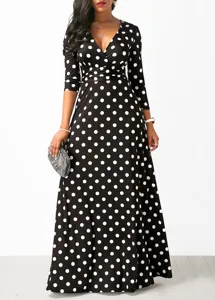 Elegant black and white polka dot maxi dress with V-neckline and long sleeves for women.