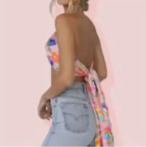 Sexy colorful floral print backless halter top for women, perfect for summer beach parties.
