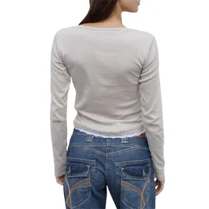 Back view of a grey fake two-piece slim long sleeve t-shirt with lace hem detail.